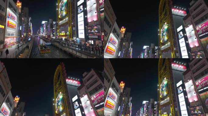 日本大阪，道顿堀运河上的观光船，两边都有发光的招牌