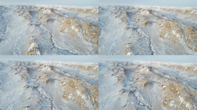 航拍冬季阿勒泰野狼谷雪山前进