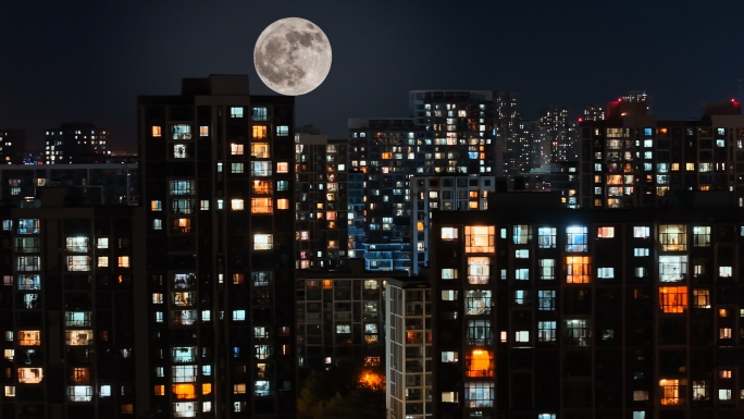 中秋月亮万家灯火小区居民楼夜景月亮中秋