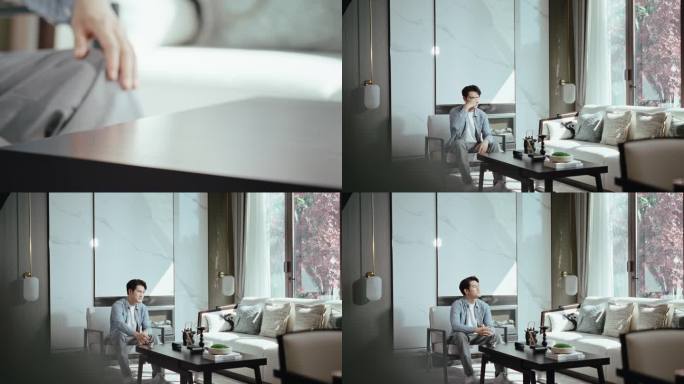 男士品茶看向远方思考