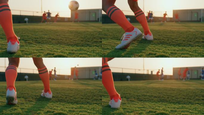 夕阳下足球场踢球比赛友谊赛