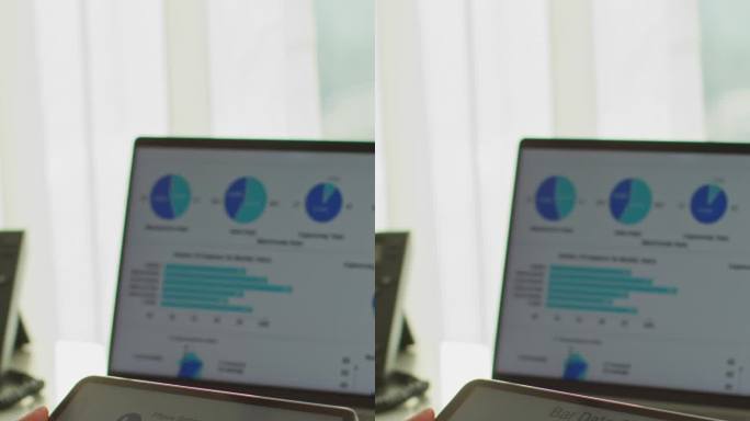 在办公室里用平板电脑和财务图表工作的女商人