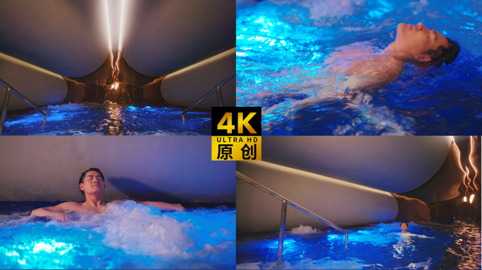 蓝色汤泉中男子泡泉享受
