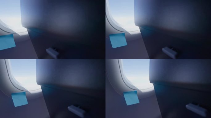 一张空白的蓝色便利贴贴在飞机的侧窗上，可以俯瞰窗外的蓝天和白云。