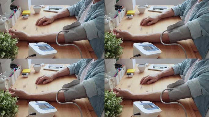 侧视图男性血压测试用于家庭健康监测或医学测试