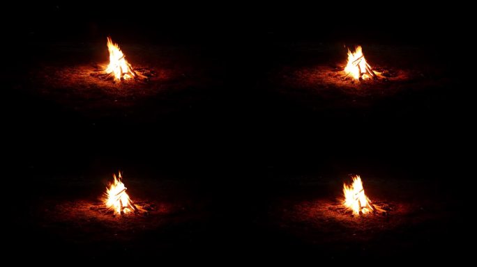 火在夜间燃烧着明亮的火焰