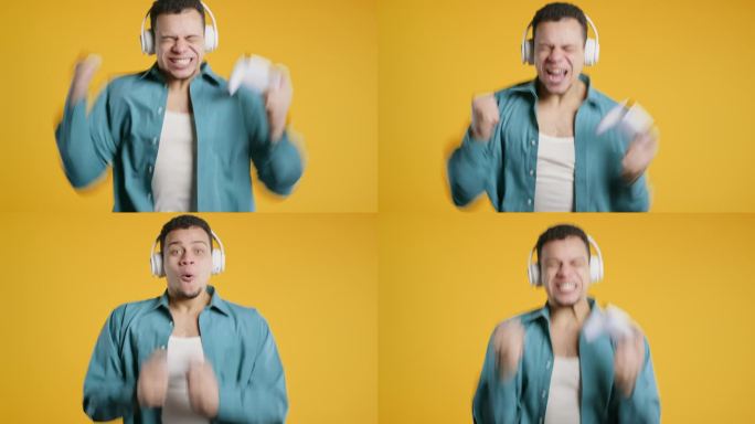 兴奋的玩家玩，赢得在线视频游戏的控制台与手柄