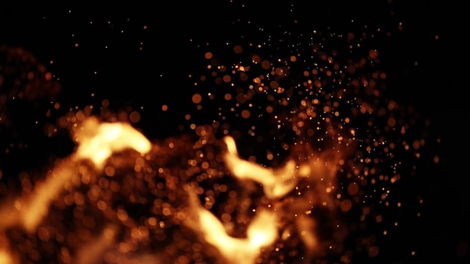 黑色背景上燃烧的火焰和飞溅的火花。可以使用添加或屏幕混合模式作为覆盖设计元素。慢动作视频