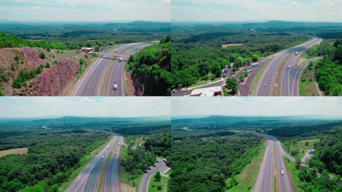 以下拍摄的干货车和冷藏半卡车在滑坡山高速公路，马里兰州，美国