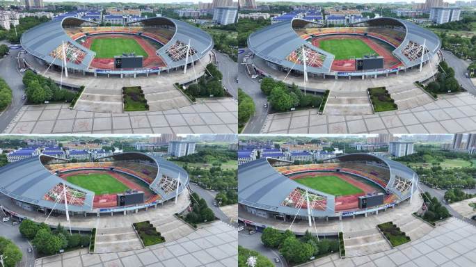 晴天航拍现代建筑衡阳市体育中心足球场空镜