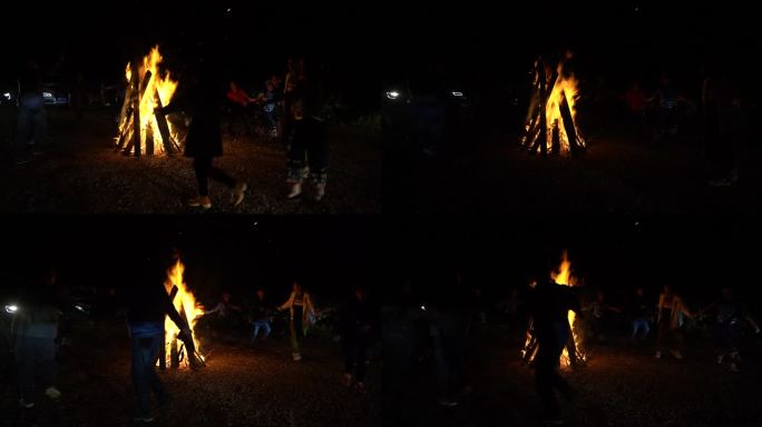 篝火晚会跳舞的人们