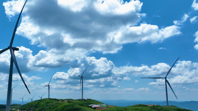 大气唯美蓝天白云山顶风力发电航拍