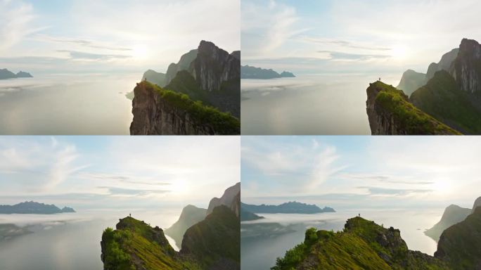 登山者在北极挪威的森加山脊峰全景峡湾景观;无人机