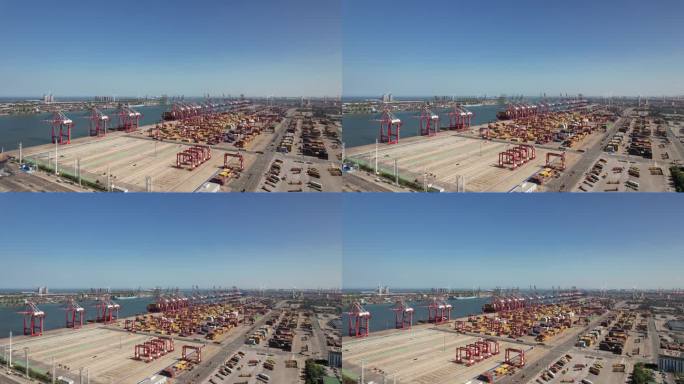 天津港集装箱码头货轮物流运输作业城市风光