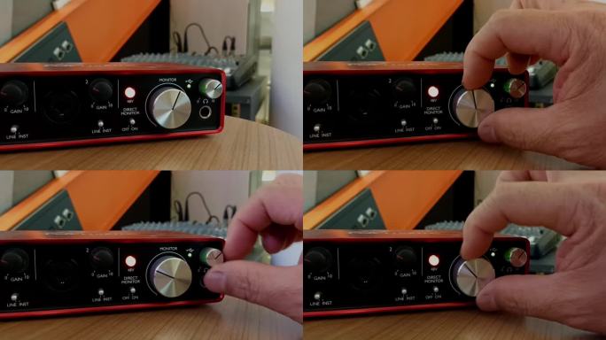 录音棚的音乐制作。手动调节增益旋钮。