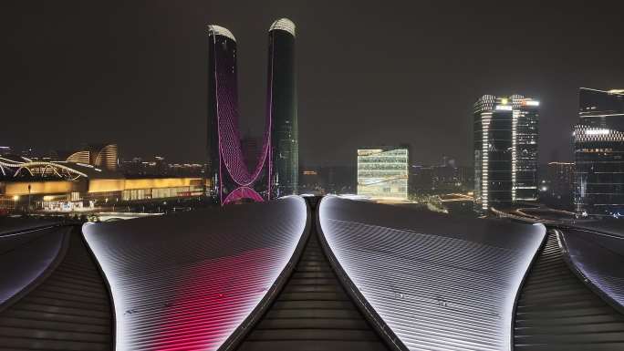 航拍杭州奥体中心城市平推运镜夜景