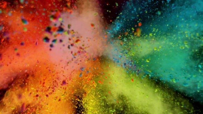 彩色粉末爆炸在黑色背景。