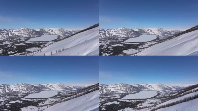 航拍新疆冬季喀纳斯河流晨雾雪山森林雪景