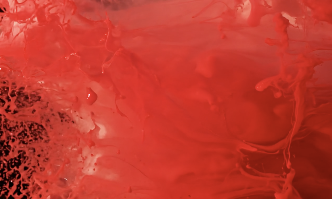 黑色背景下的红色液体流动