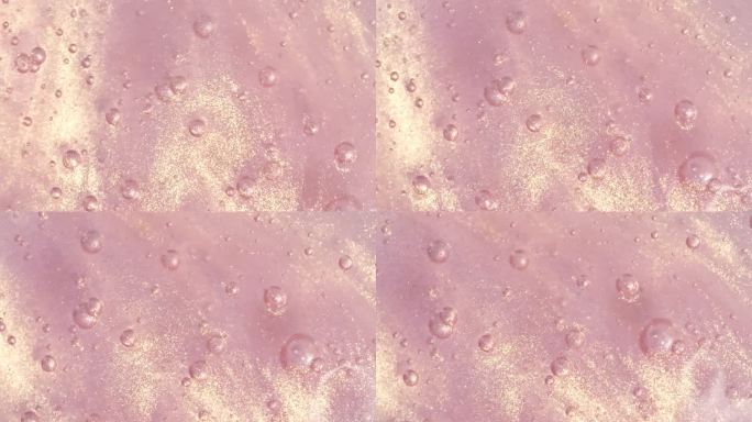 透明粉红色化妆品凝胶流体与分子气泡分布。泡簇运动，显微镜下的细胞。天然有机化妆品、药品微距拍摄。特写