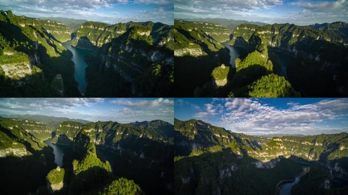 航拍山区陡峭的山峰峡谷日出