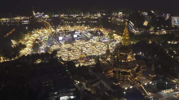西双版纳景洪告庄星光夜市航拍城市夜景风光