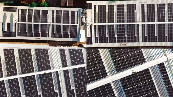 工程师在城市屋顶上配置太阳能电池板