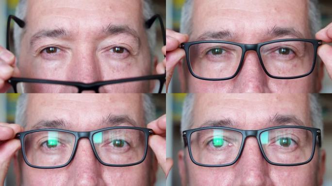 一名男子戴上黑色塑料框眼镜，以便看得更清楚