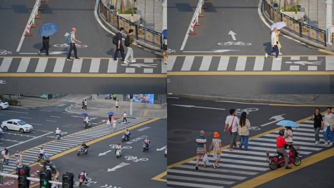 交通十字路口过斑马线的行人人群过马路