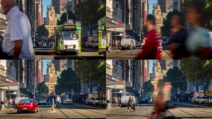 拥挤的通勤者和游客在澳大利亚维多利亚州墨尔本市伯克街和伊丽莎白街附近的弗林德斯街火车站步行和穿过马路
