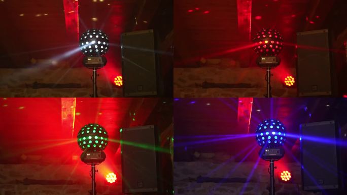 一个旋转的迪斯科球投射出美丽的彩色光线