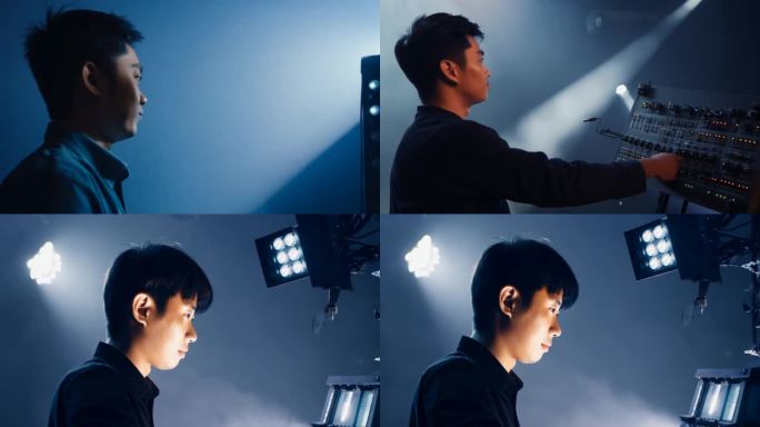 剧院后台的年轻男灯光师调试灯光效果