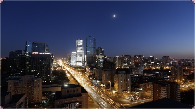 俯拍国贸华贸车流日延时 日转夜 月升