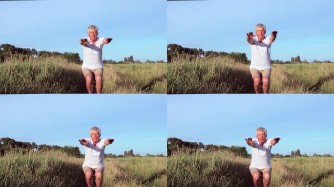 在户外活动中享受退休生活的老人，蹲着准备跑步或锻炼，定期进行体育锻炼