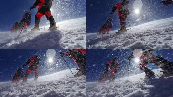 风雪中攀登慕士塔格峰雪山的登山队队员