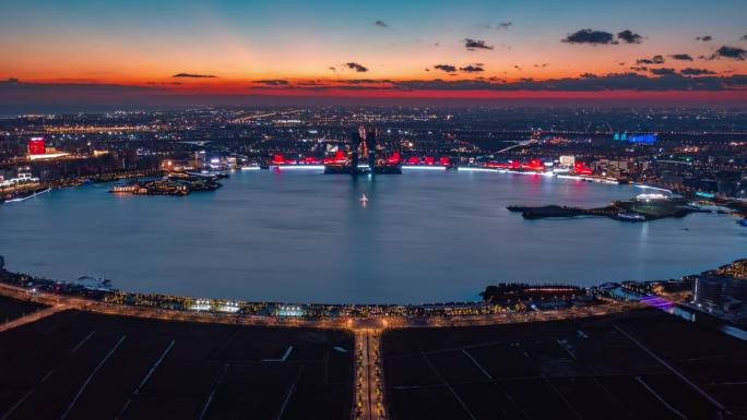 航拍上海浦东临港新城滴水湖日转夜延时摄影