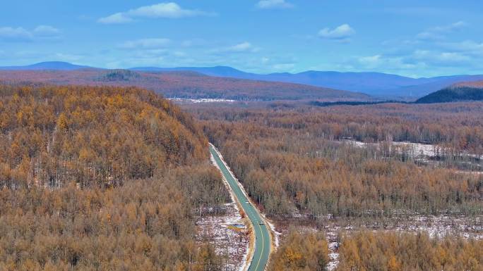 4k航拍车辆行驶在秋天的山林中