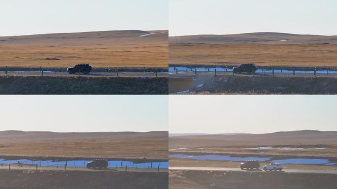 4k航拍汽车在草原公路上行驶