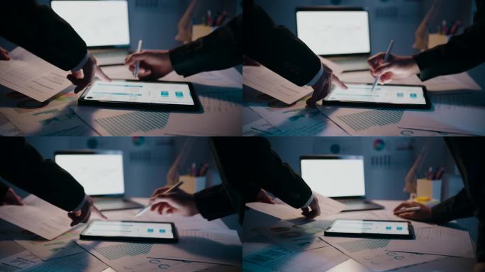 协作业务人员在办公室审核信息数据分析