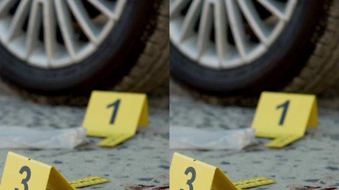 犯罪现场，号码或血迹上的鞋印作为证据，警方调查或法律程序。车轮、DNA或道路上有脚印的事故、刑事案件