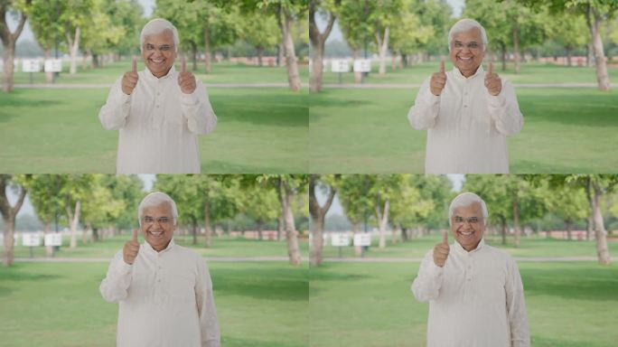 印度老人在公园竖起大拇指