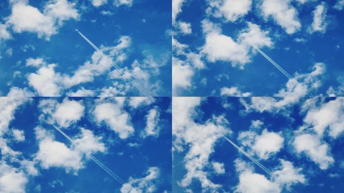 4K蓝天中带拖尾飞行的飞机