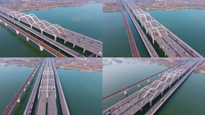 航拍城市生态区河流和轨道交通桥梁及公路桥