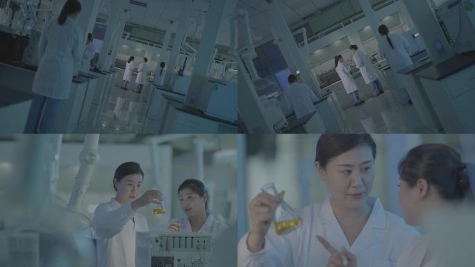 女性科研团队人员交流 现代实验室