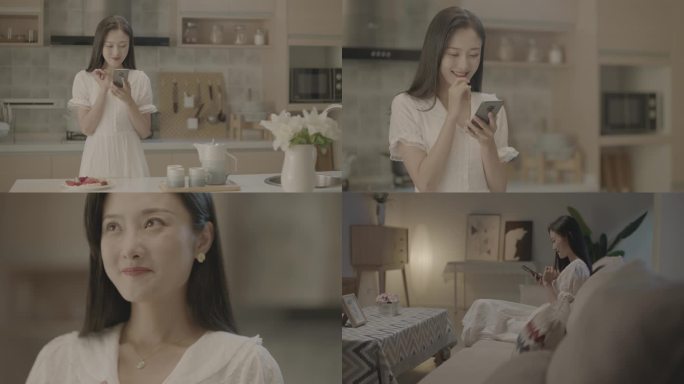 美女居家看手机