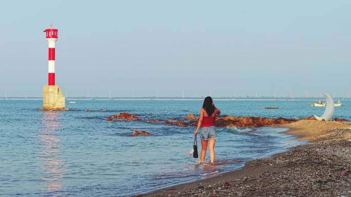 海洋灯塔 海滩美女