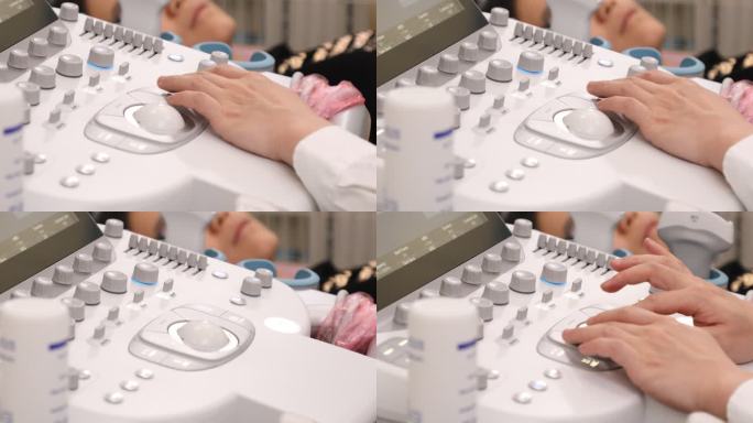 医生使用超声设备给患者检查2
