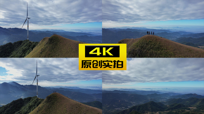 一群人站在山顶看风景