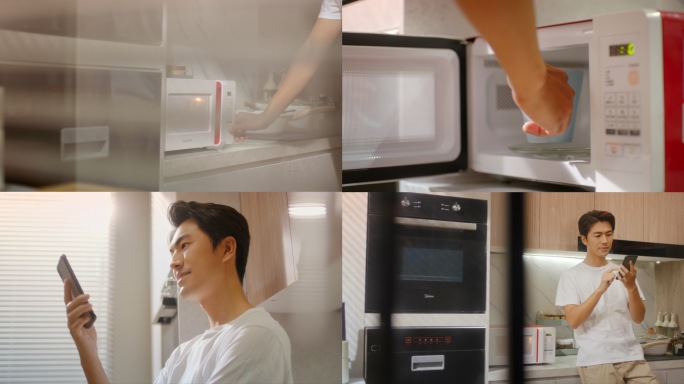 男人热牛奶看手机看新闻男人微波炉热早餐