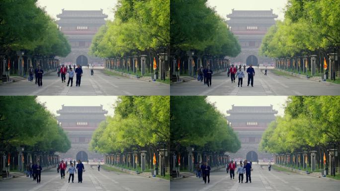 北京中轴线永定门公园林荫步道清晨风光